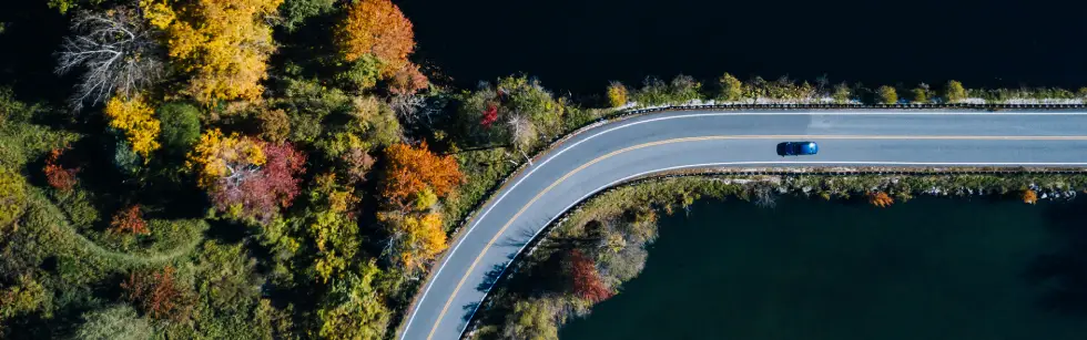 Car driving in autumn